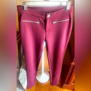 Burgundy medium G by Guess pants can be worn to work.